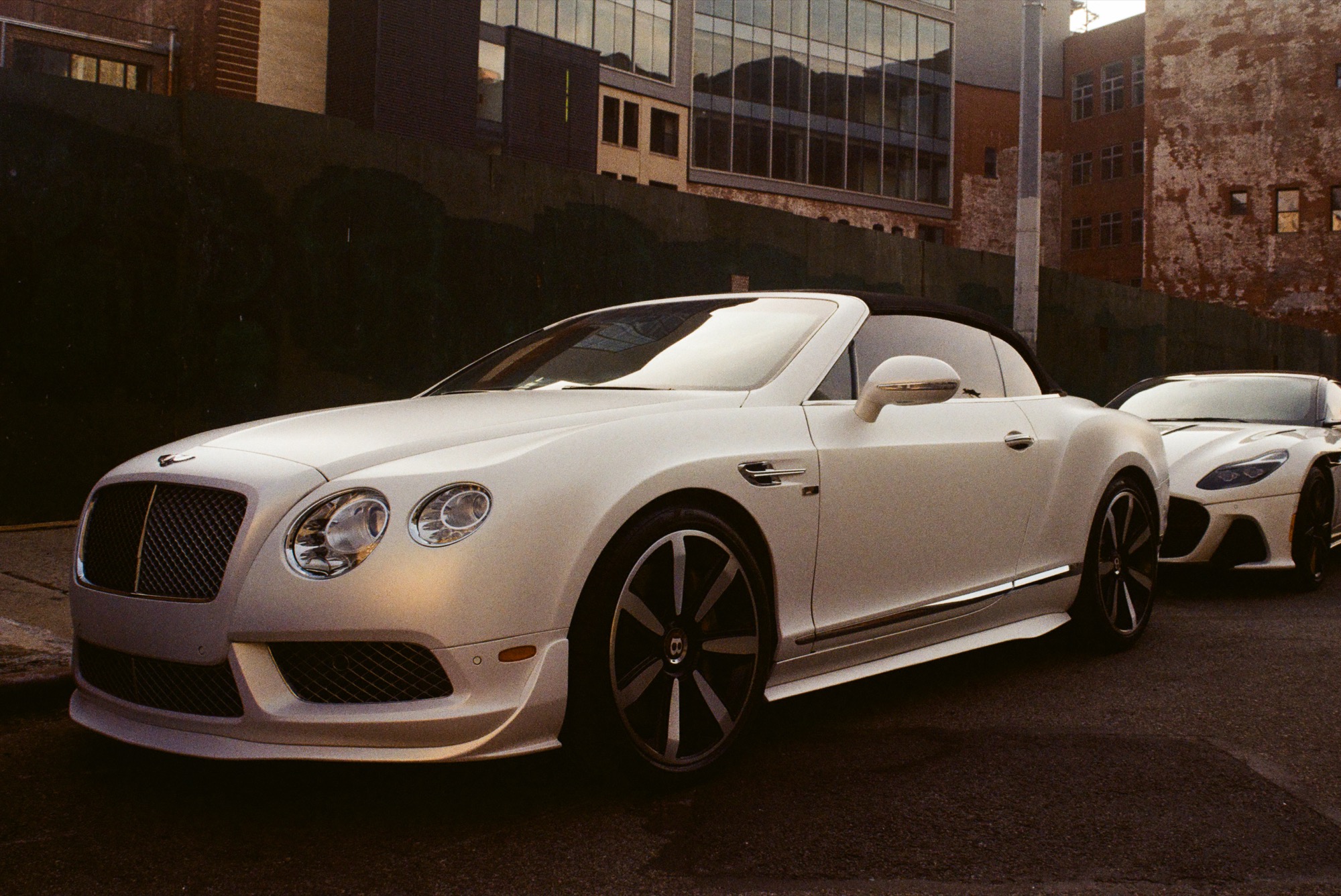 White Bentley convertible at golden hour