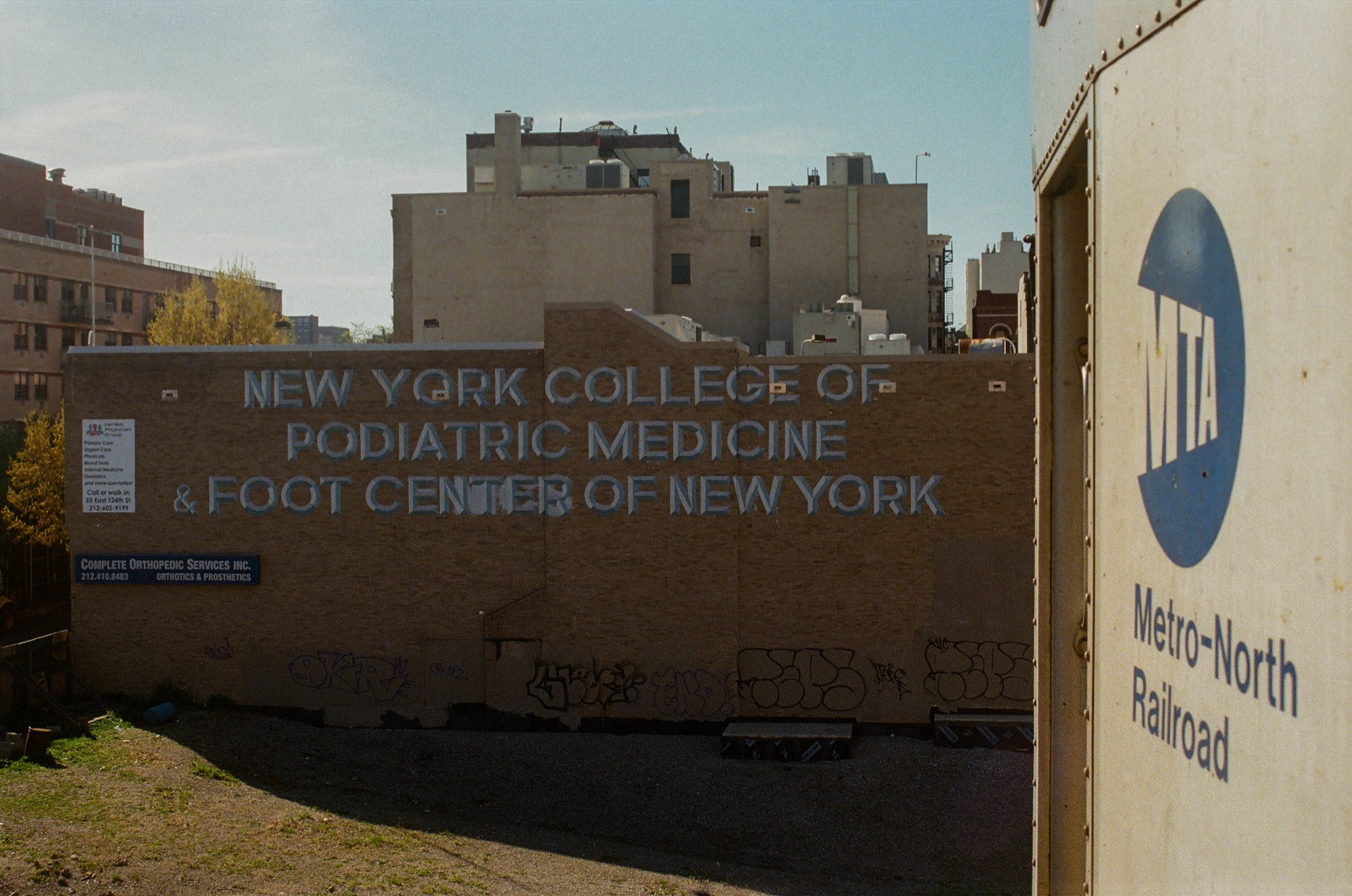 New York streetscape with a Metro-North railcar